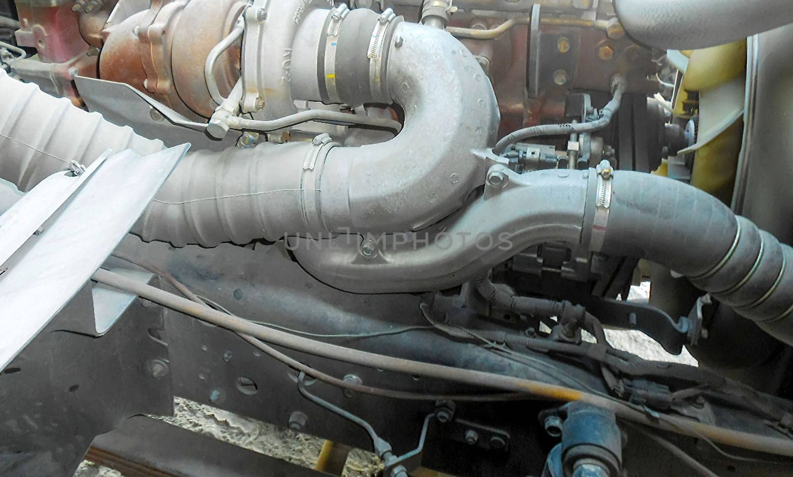 Diesel truck engine or truck engine with copy space for text. Metallic background of the internal diesel truck engine or car engine.