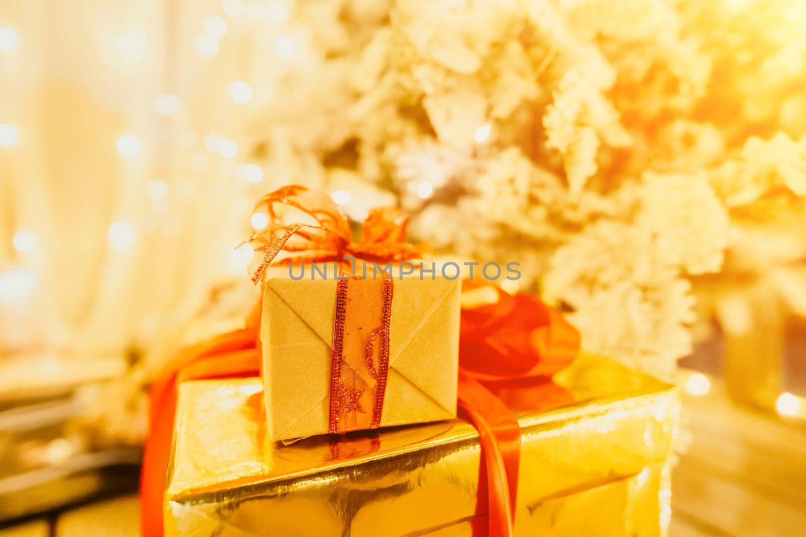 presents under Christmas tree, festive and celebratory atmosphere. by panophotograph