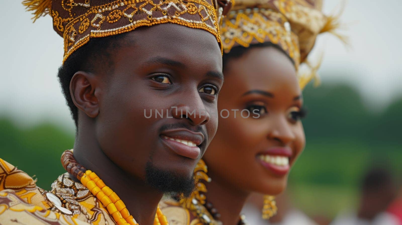 A couple of two people wearing fancy clothes and jewelry