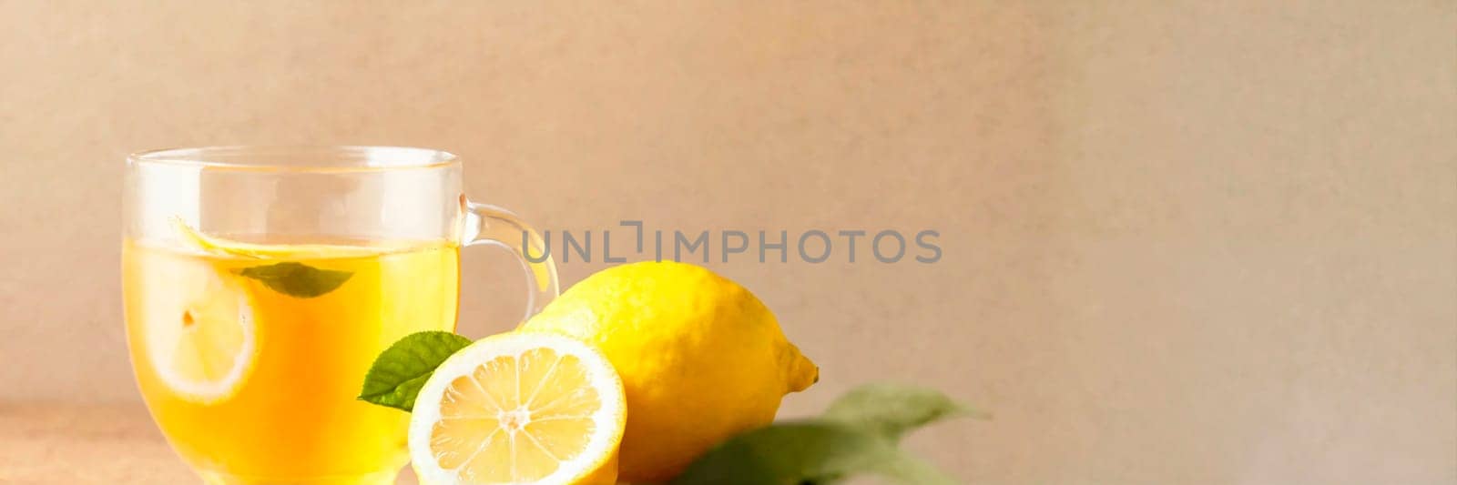 cup of tea and lemon on the table. Selective focus. drink.