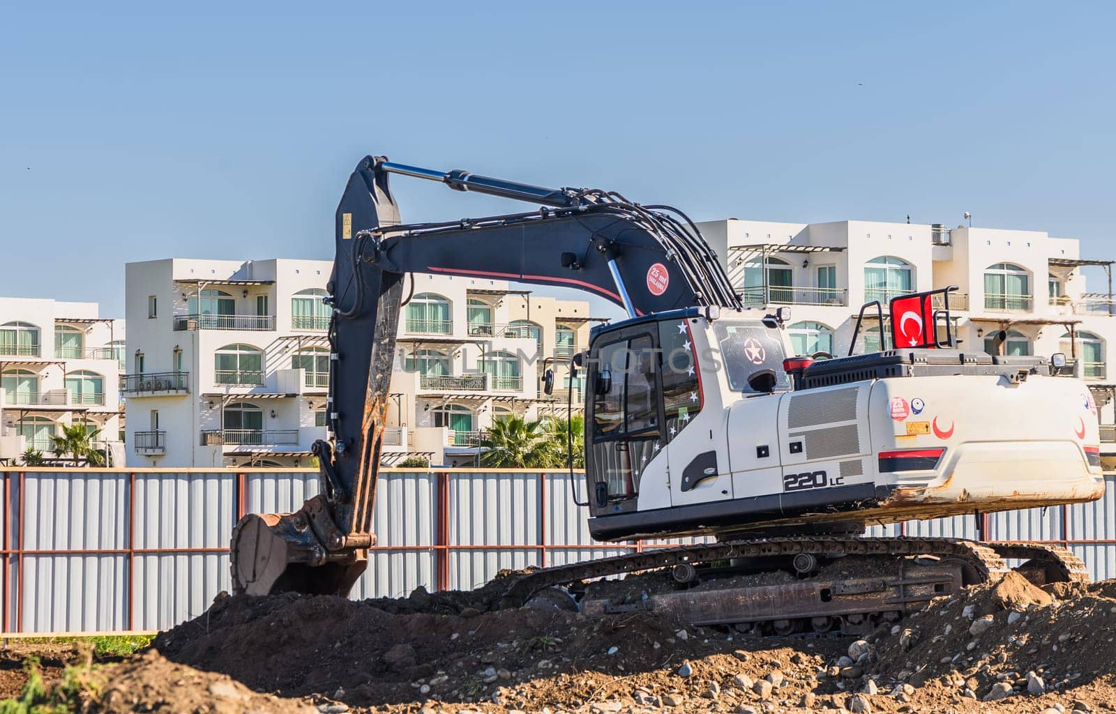 Close up details of industrial excavator working on construction site