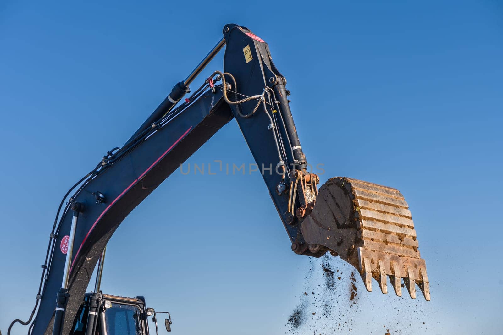 Close up details of industrial excavator working on construction site 3
