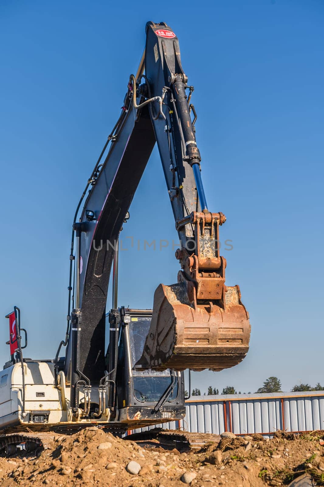 Close up details of industrial excavator working on construction site 6