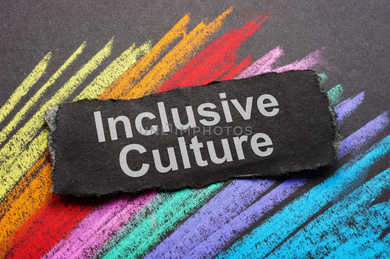 Inclusive culture concept. Colored stripes with a chalk and a piece of paper.