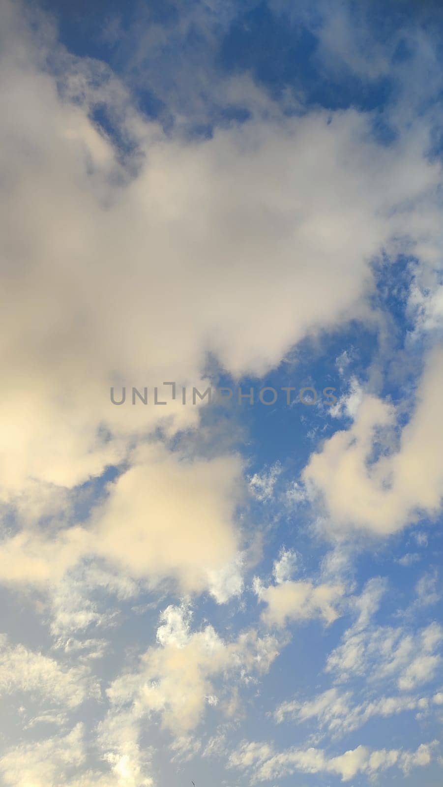 Blue light sky nature white clouds whether background . High quality photo
