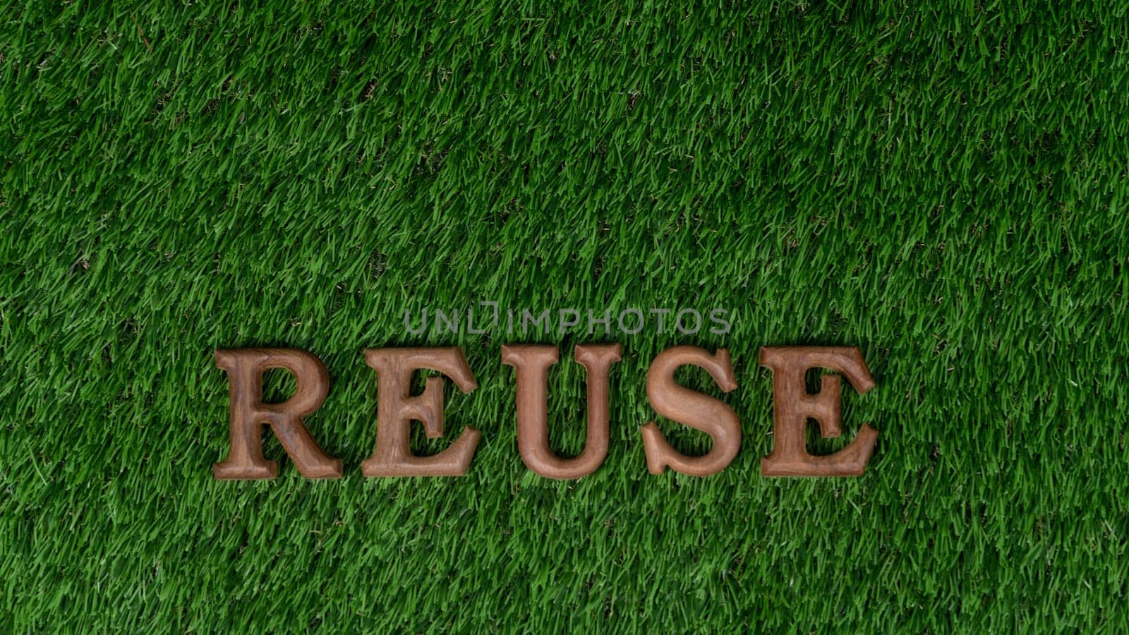 Environmental awareness campaign showcase arranged recycle message in on biophilic green grass background. Environmental social governance concept idea for sustainable and greener future. Gyre