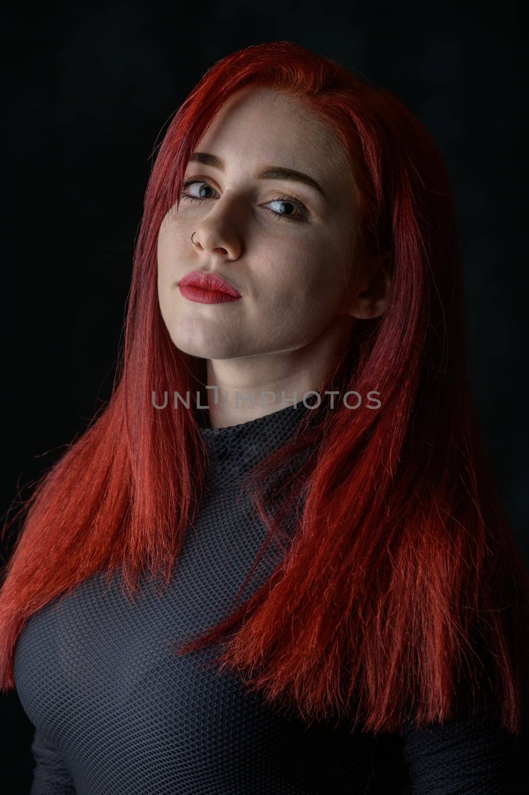portrait of a sexy beautiful cute girl with red hair