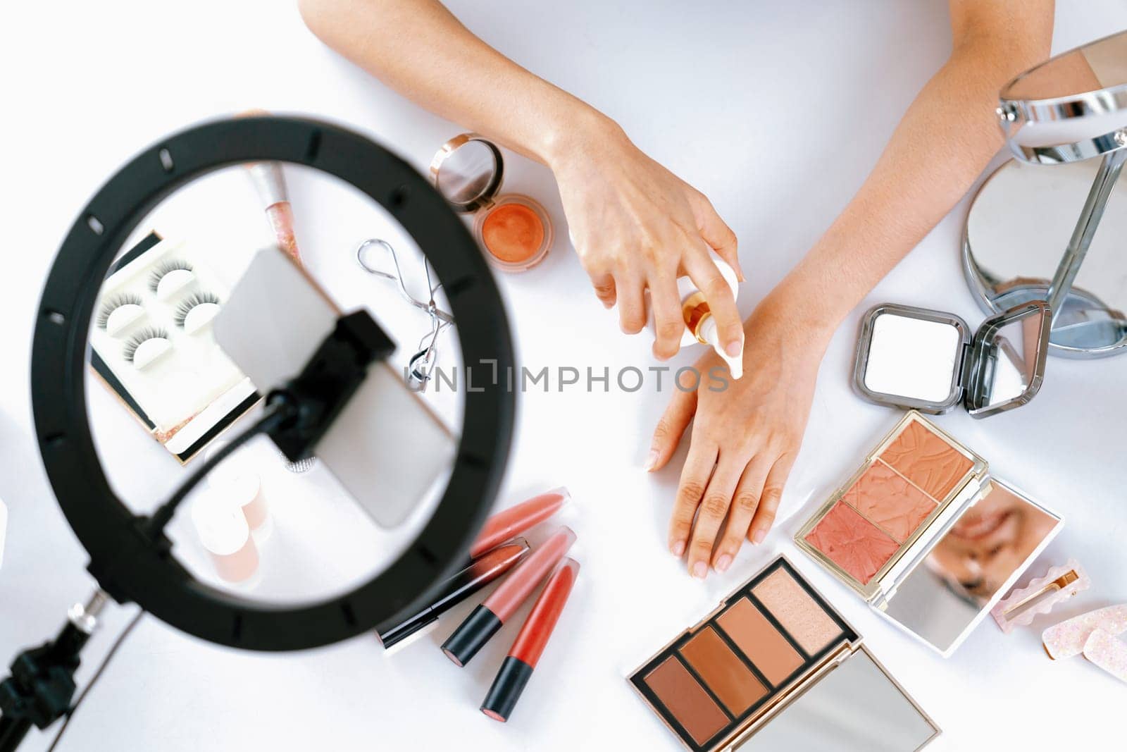 Close up top view image of beauty influencer shoot uttermost marketing video by biancoblue