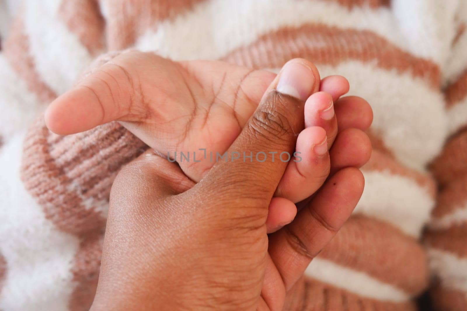 father holding hand of baby child, by towfiq007