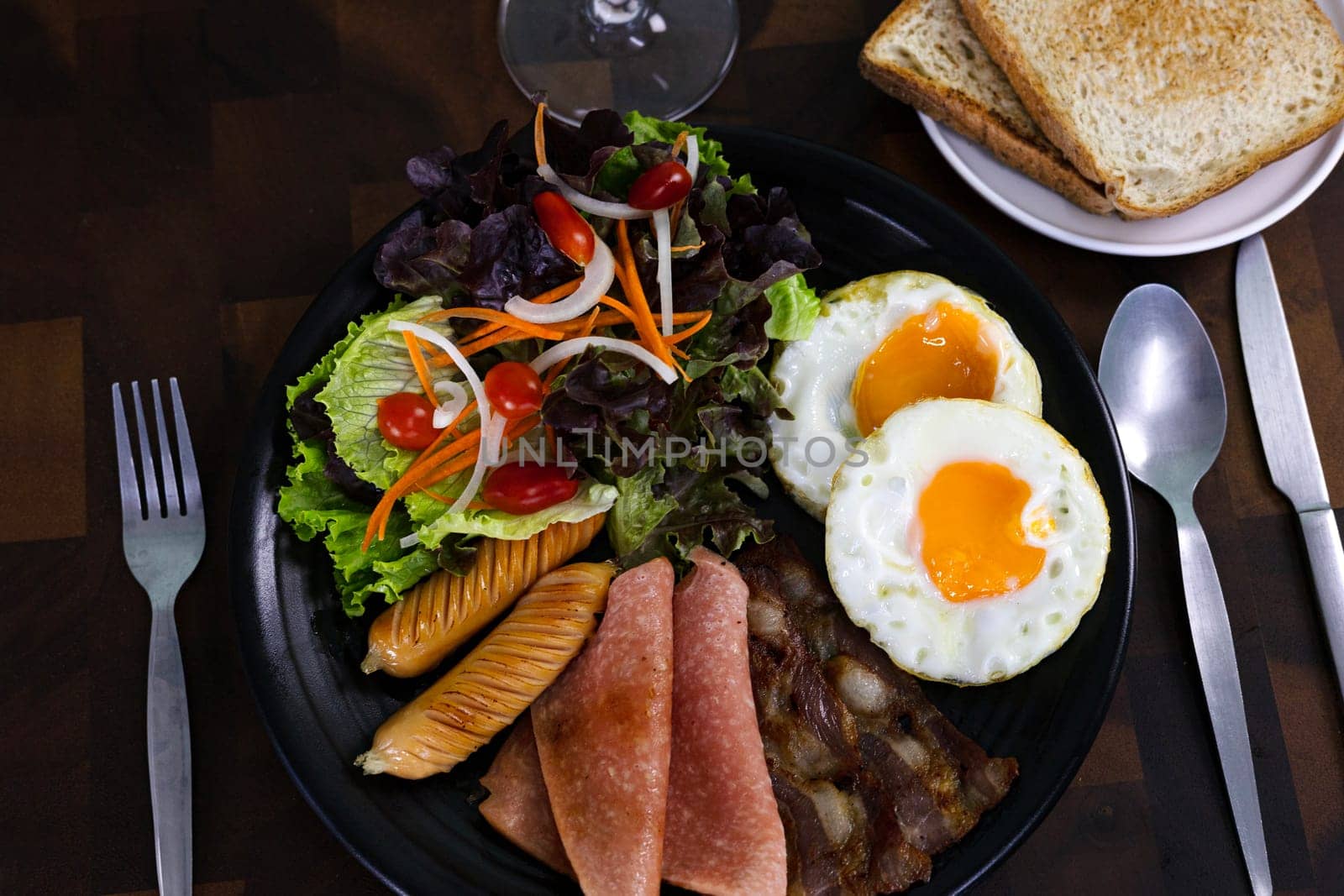 Healthy Breakfast With Fresh Organic Vegetable Salad Fried Egg And Sausages. Fresh food.