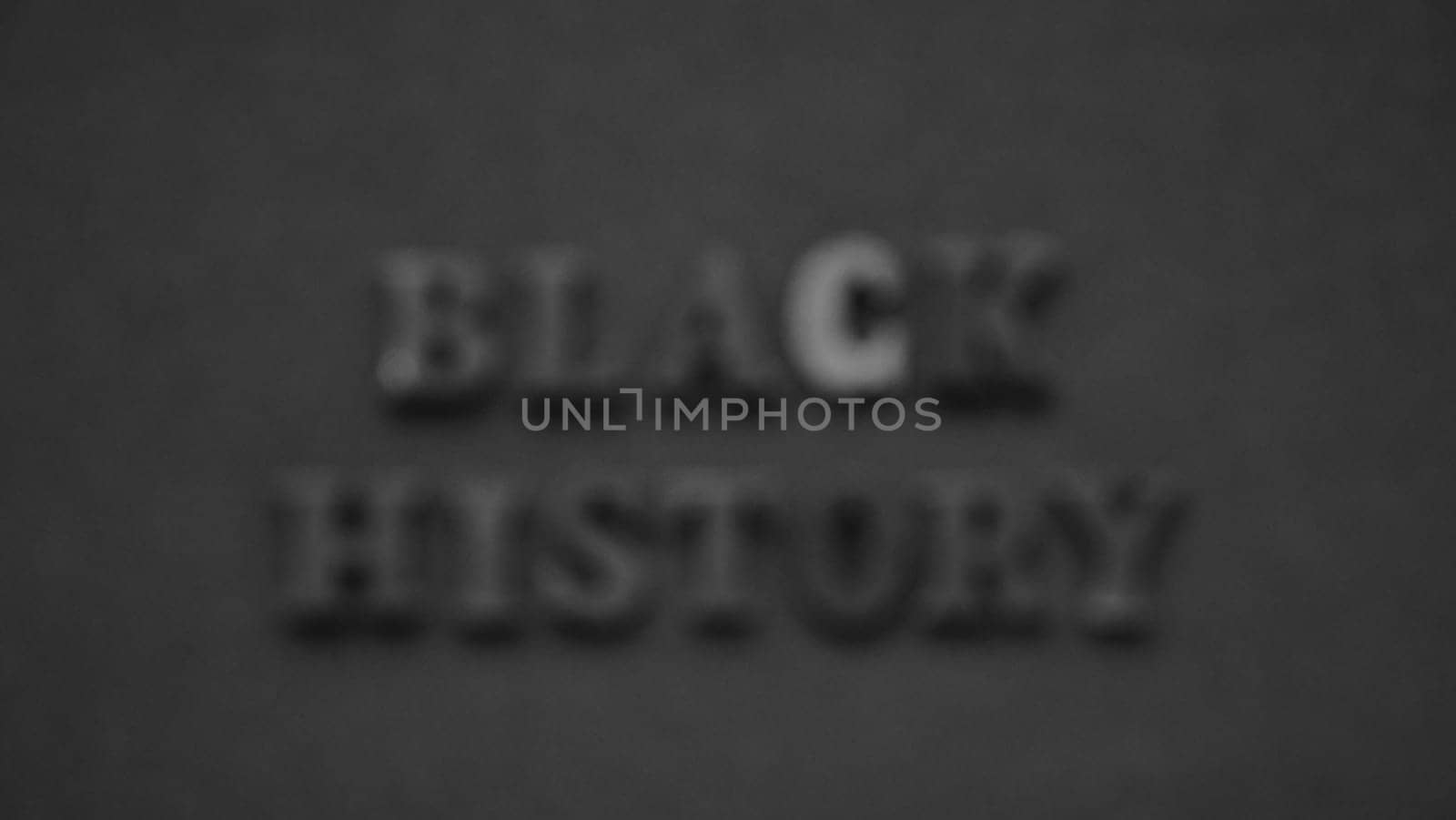 Inscription text Black History Month on dark grey isolated background close up. Celebrating the African American Conceptual Holiday for Equality