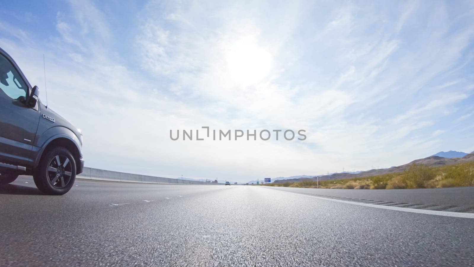 HWY 15, California, USA-December 3, 2022-Embarking on a road trip from Nevada to California, driving on Highway 15 during the day offers scenic views and an exciting journey between states.