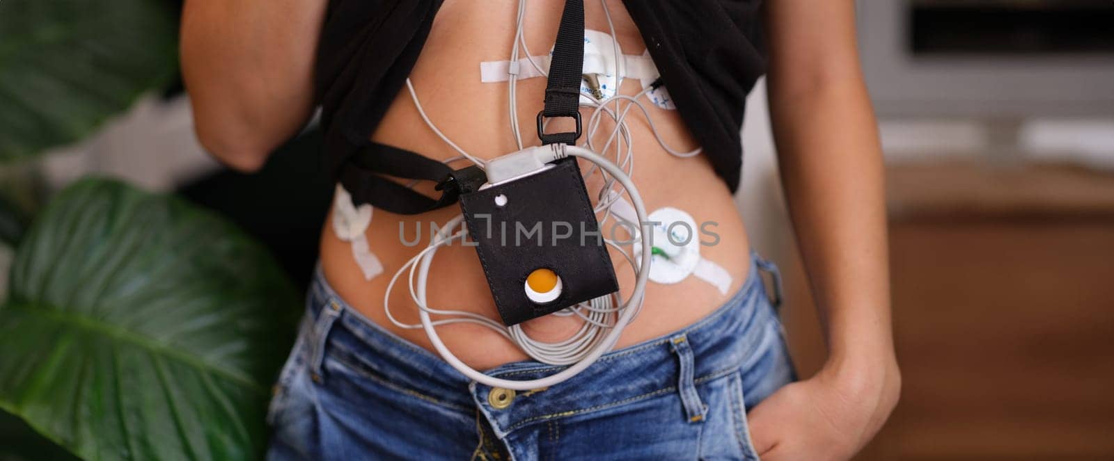 24-hour ECG monitoring and Holter monitoring on a woman body. Cardiac examination and heart health