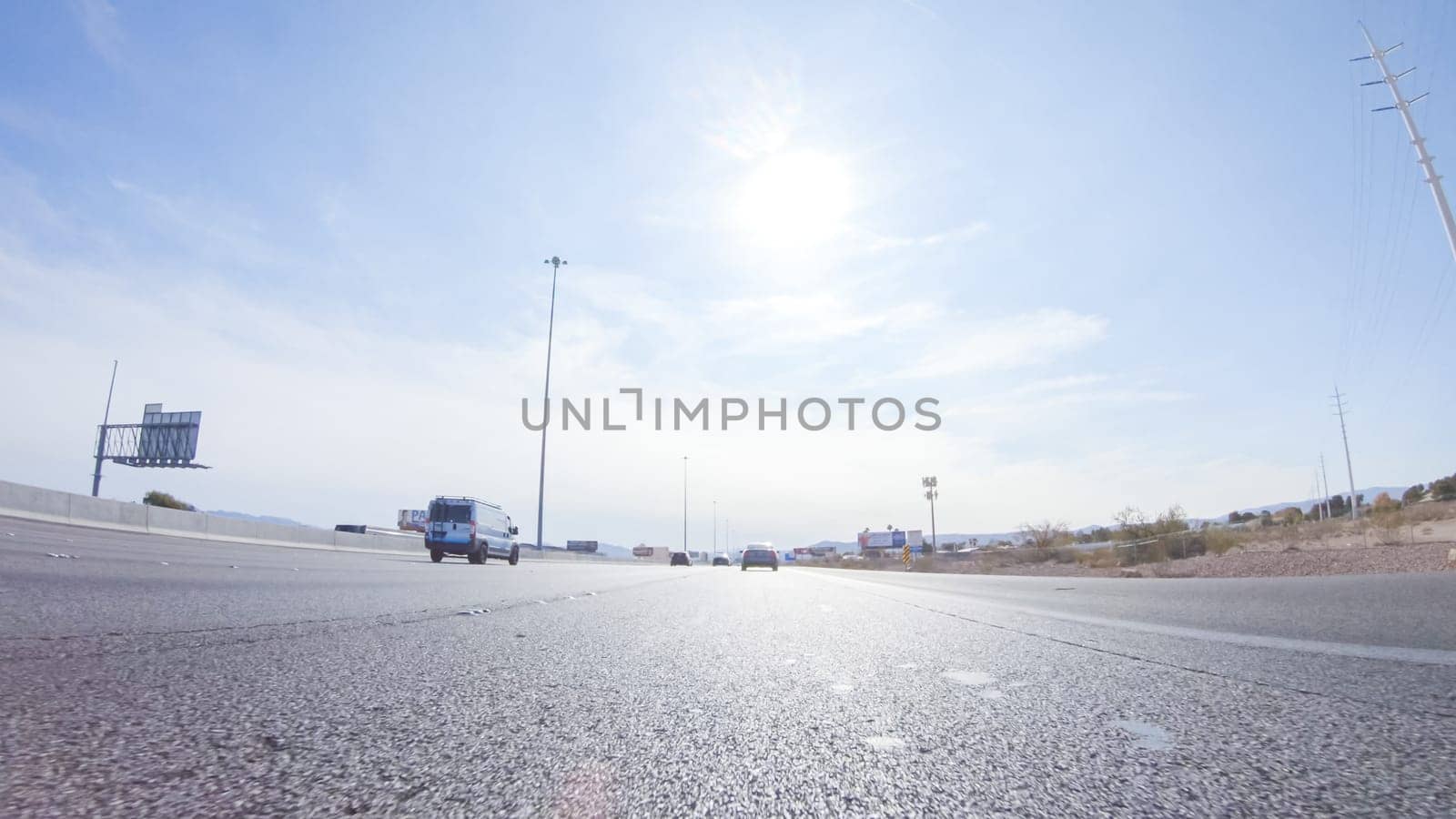 Las Vegas, Nevada, USA-December 3, 2022-Embarking on a road trip to California, driving through Las Vegas on Highway 15 during the day offers a vibrant and lively journey through the famous city.