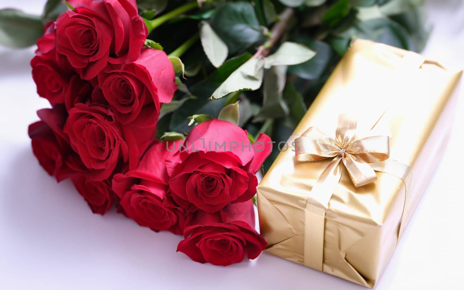 Gift golden box for valentine day with red roses by kuprevich