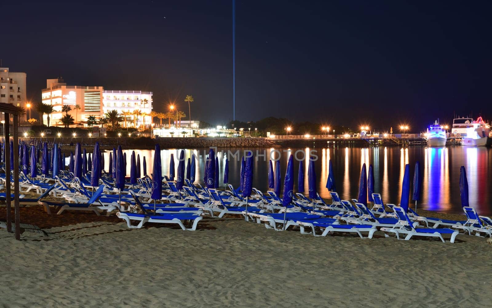 Protaras, Cyprus - Oct 10. 2019. Night landscape of famous Sunrise beach by olgavolodina