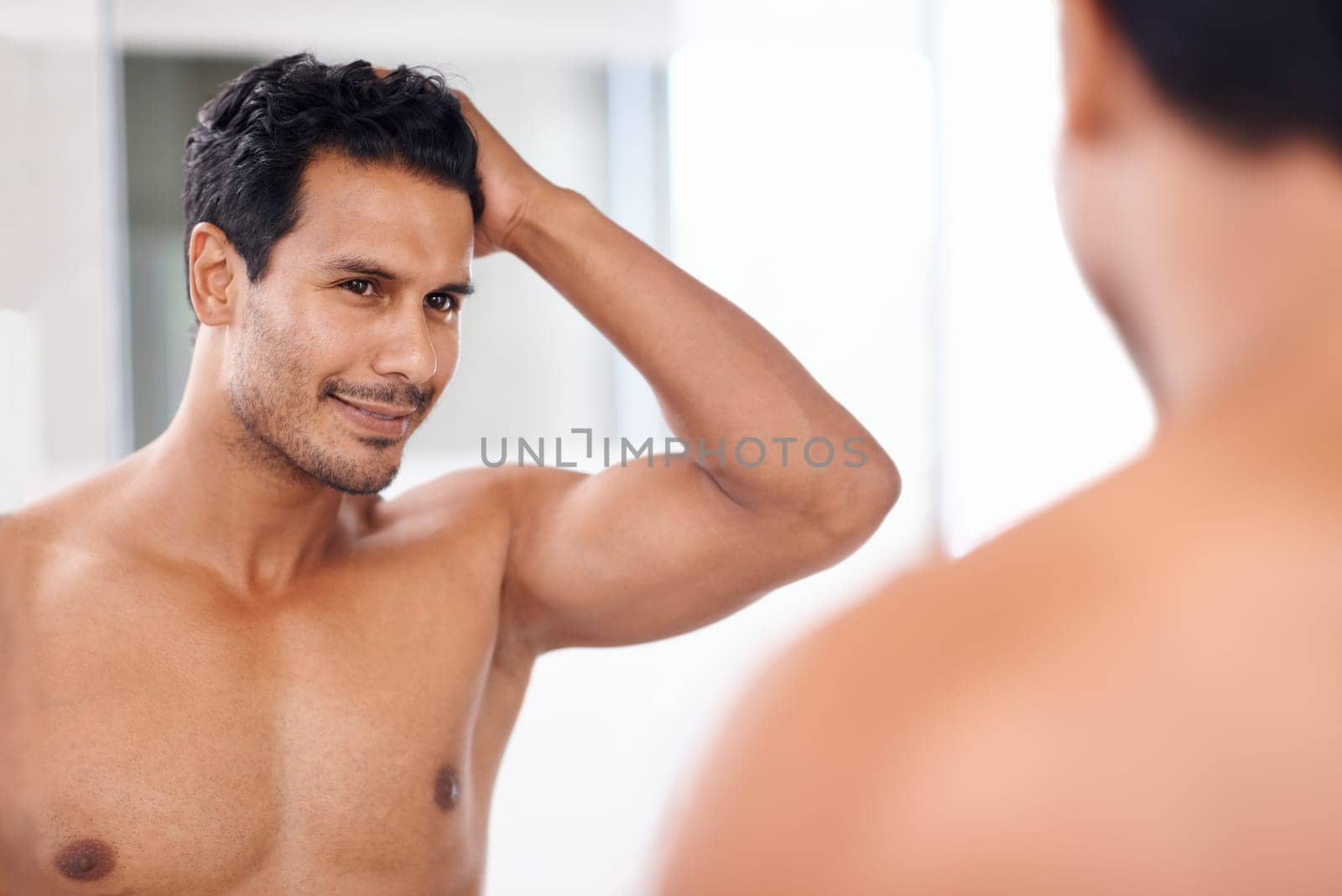 Body, bathroom mirror and happy man with hair check in house for skincare, wellness or morning routine. Hairline, reflection and male person with growth, texture or satisfaction after shower at home by YuriArcurs
