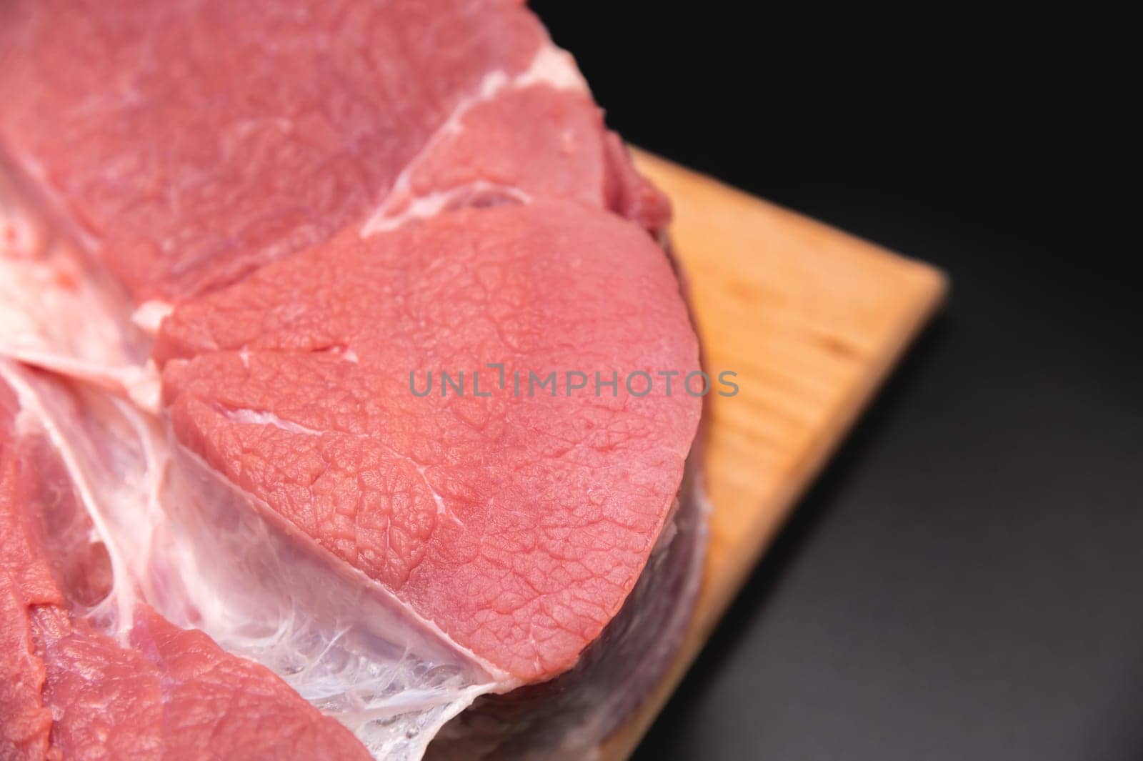 Raw large premium steak. Raw fresh premium beef in shallow depth of field by yanik88