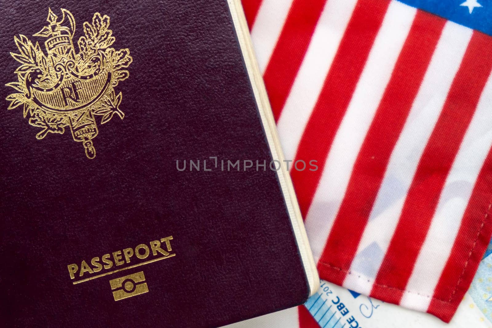 France passport on United States flag and Euro currency background. Concept of business, trade, employment, vacation travel. Concept coming summer Olympics. Closeup photo high quality photo.