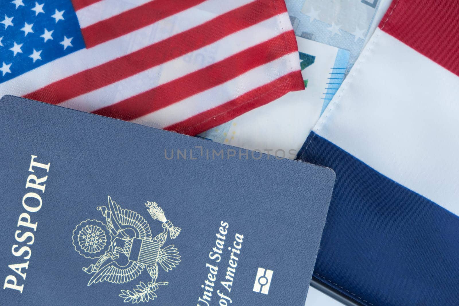 United States and France passports on Euro currency transparent background. Flat lay. Concept of business, trade, friendship, employment, vacation travel. Concept coming summer Olympics. Closeup photo high quality photo.