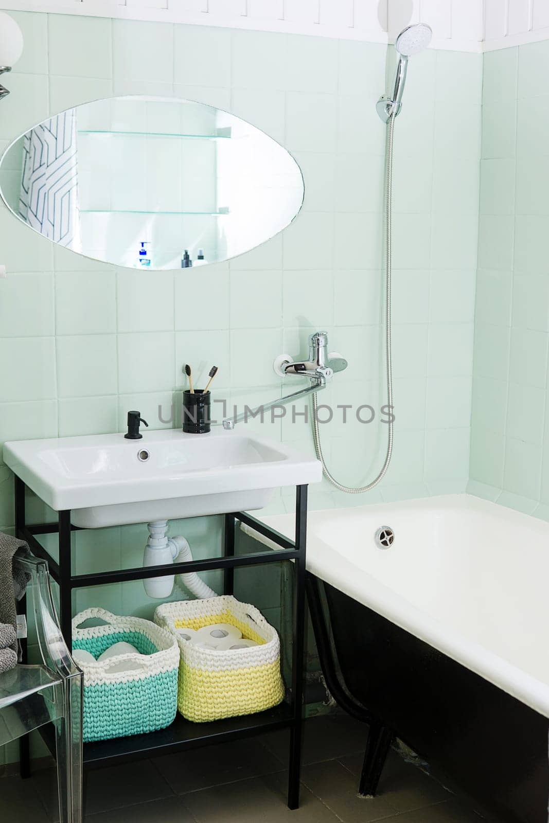 Budget bathroom interior in bright colors. Details of the bathroom interior