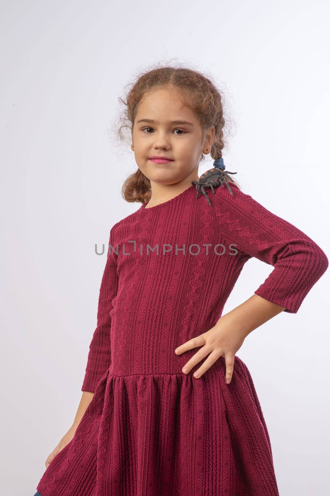 studio portrait of a charming little girl on a white background 13