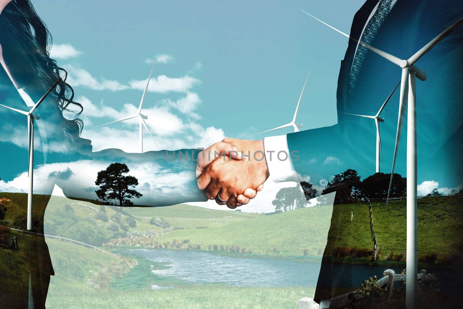 Double exposure graphic of business people handshake over wind turbine farm and green renewable energy worker interface. Concept of sustainability development by alternative energy. uds