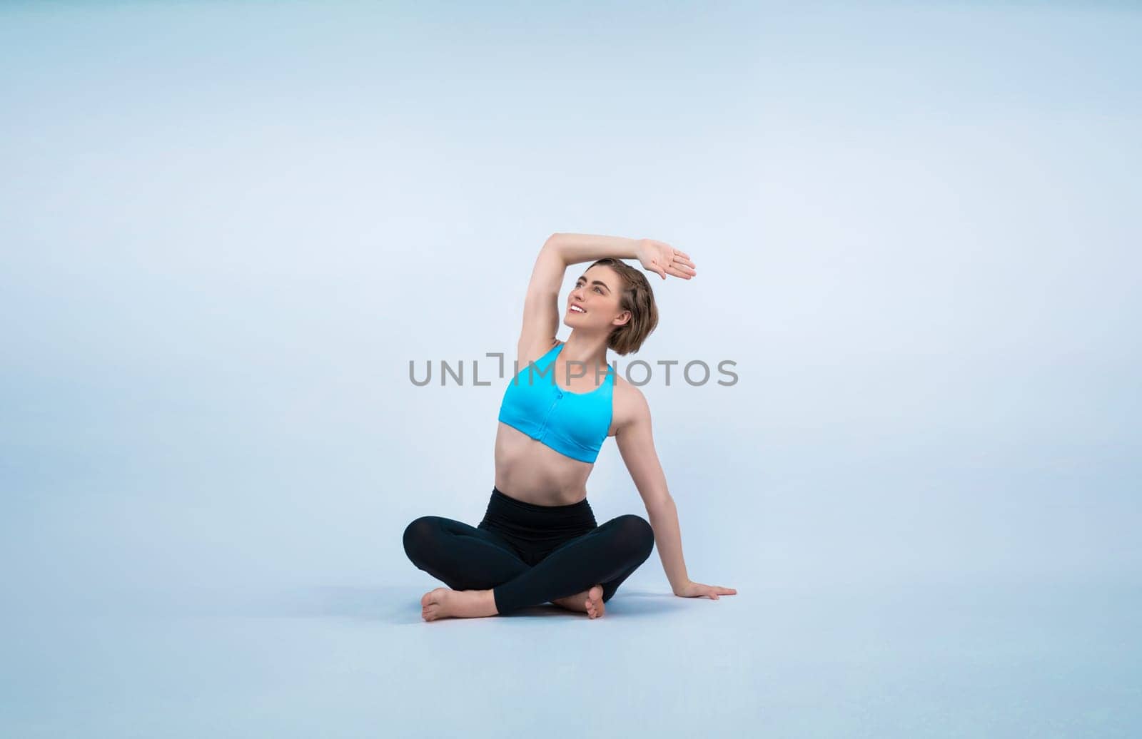 Full body length gaiety shot athletic and sporty woman doing healthy and meditative yoga exercise workout posture on isolated background. Healthy active and body care lifestyle