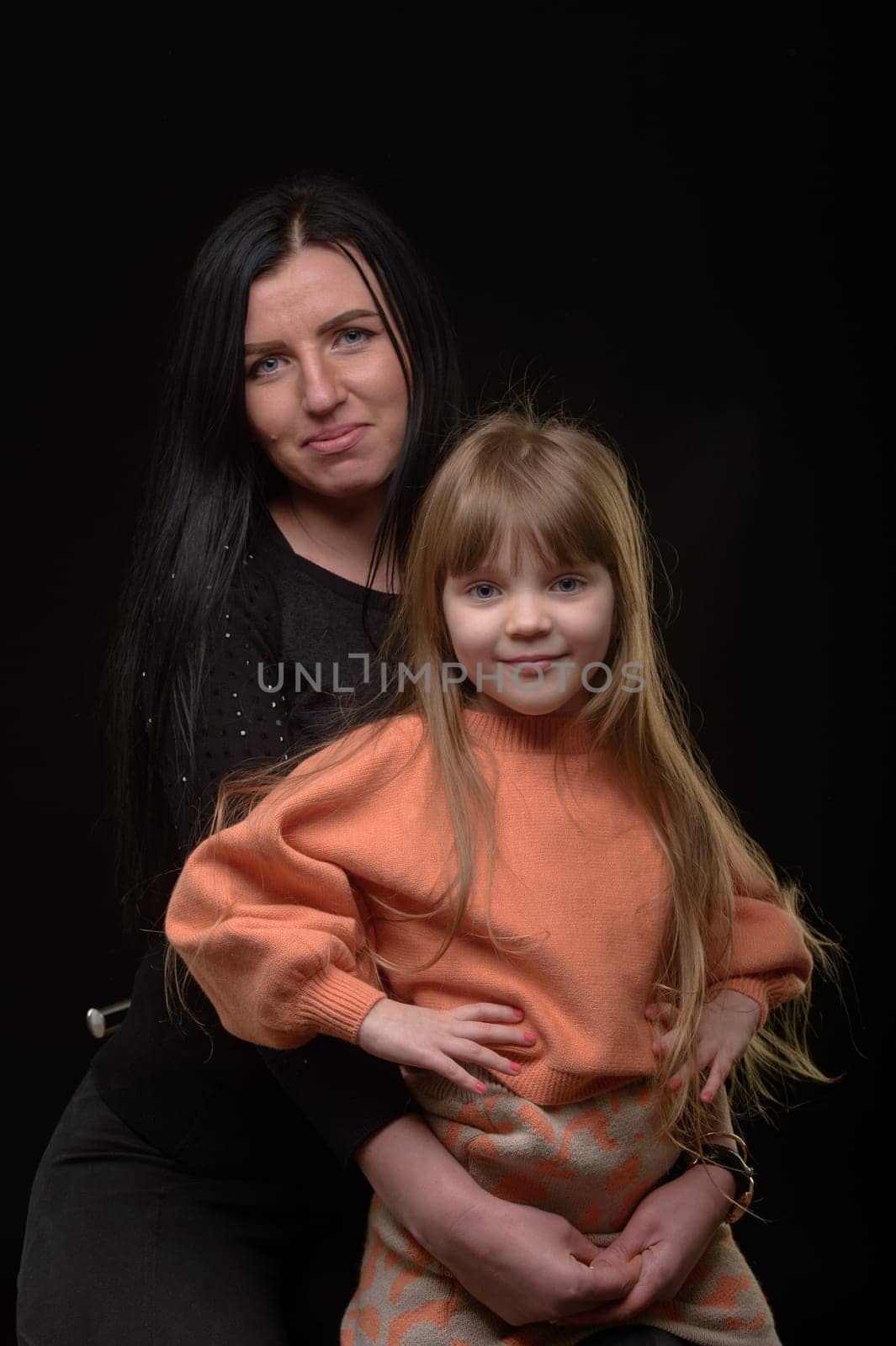mother and daughter studio portrait happy family 5