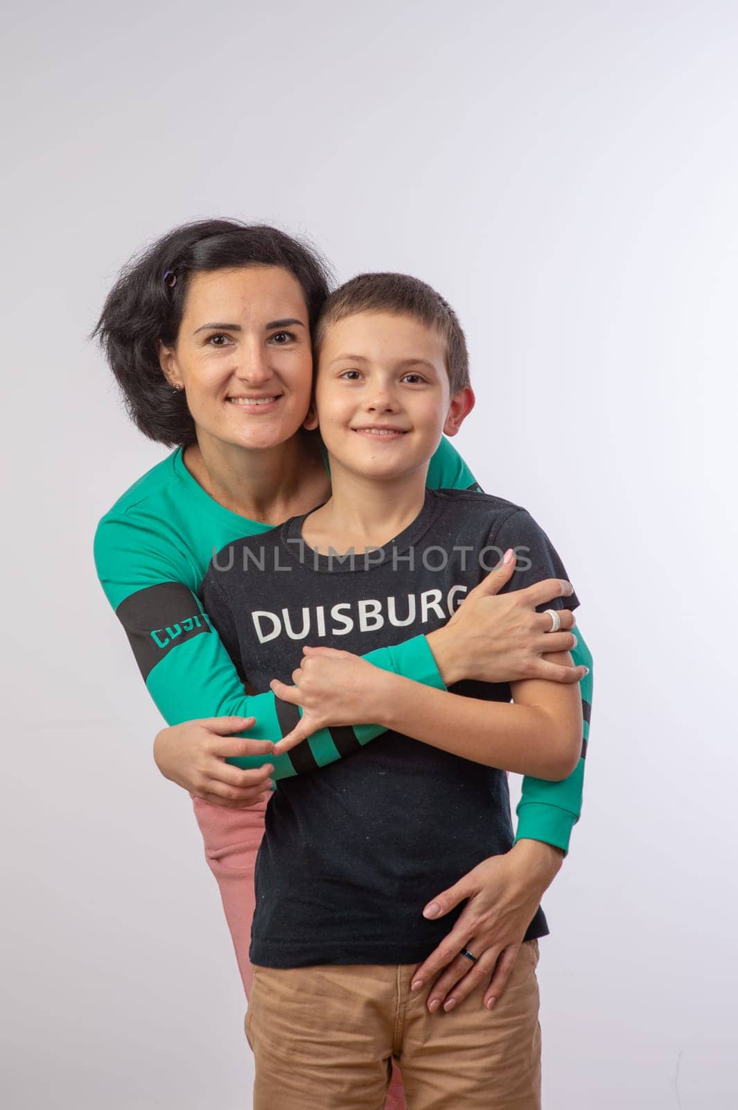 mother and son studio portrait happy family 2