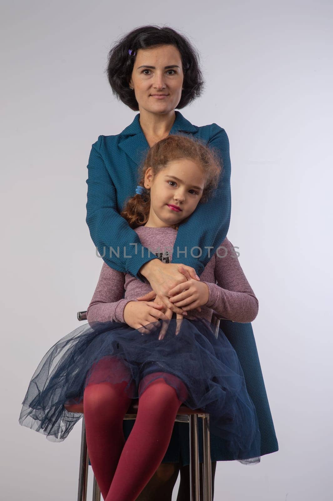 mother and daughter studio portrait happy family 1