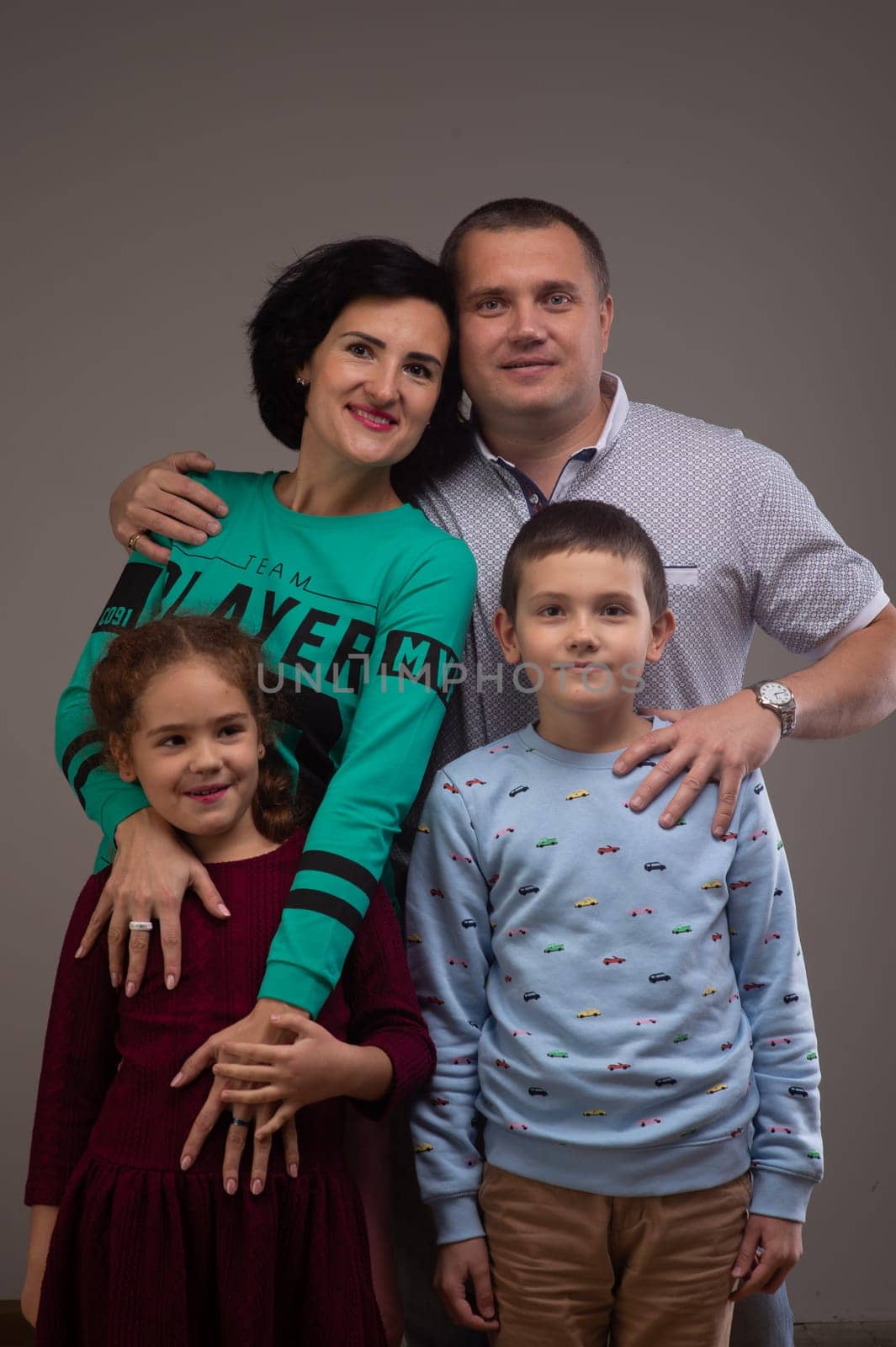 studio portrait of a happy family husband wife daughter and son 10 by Mixa74