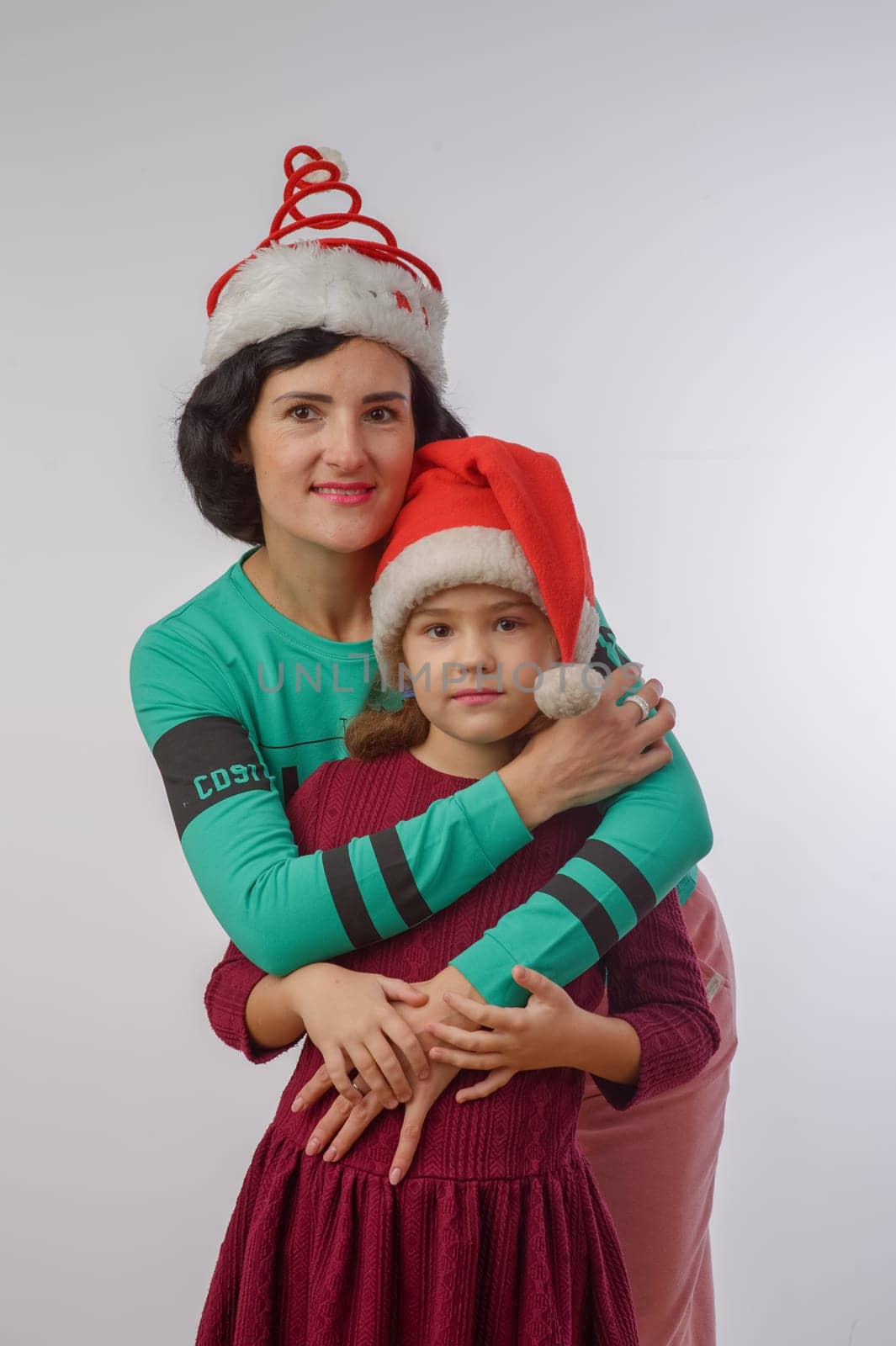 mother and daughter new year studio portrait happy family 1