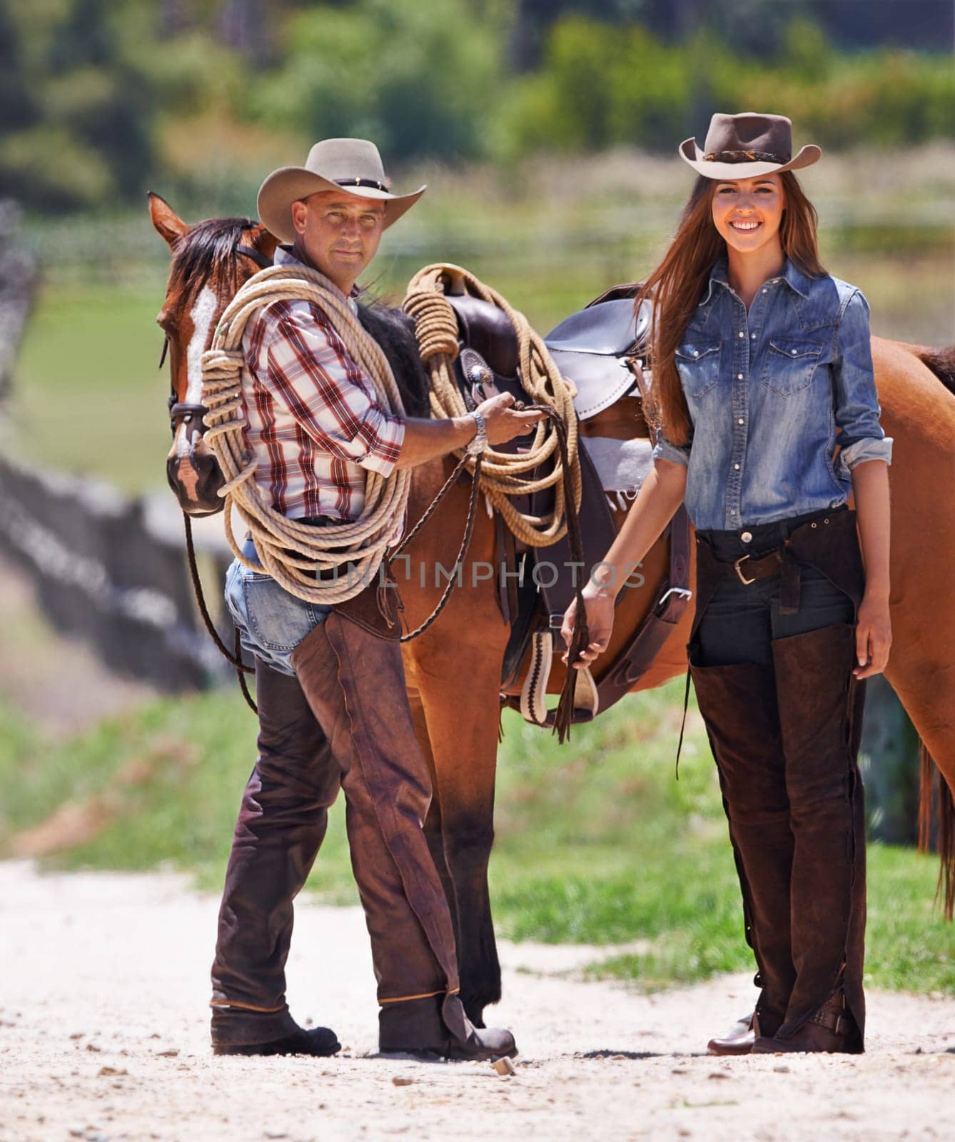 Ranch hands, horse and happy in portrait on farm and working in equestrian job in country. Man, woman and smile face of cowboy in outdoor, collaboration and pride by healthy animal or texas colt.