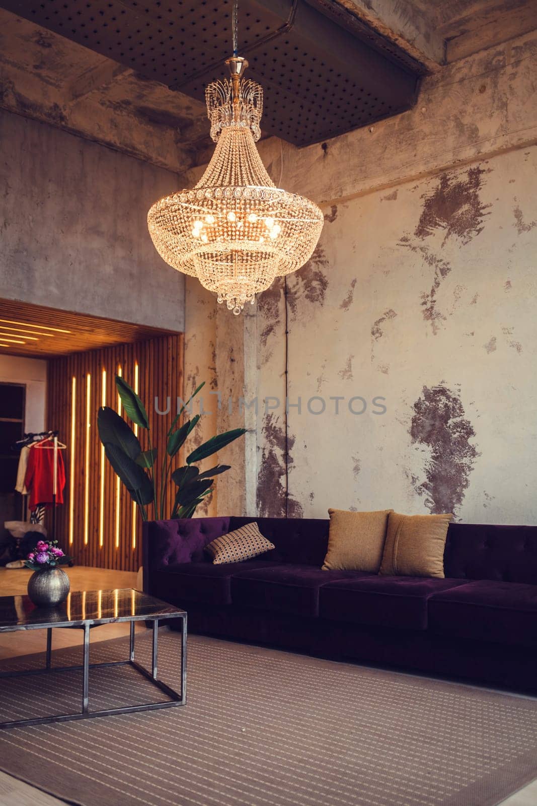 real apartment in Europe. vintage chandelier in a loft or art modern room