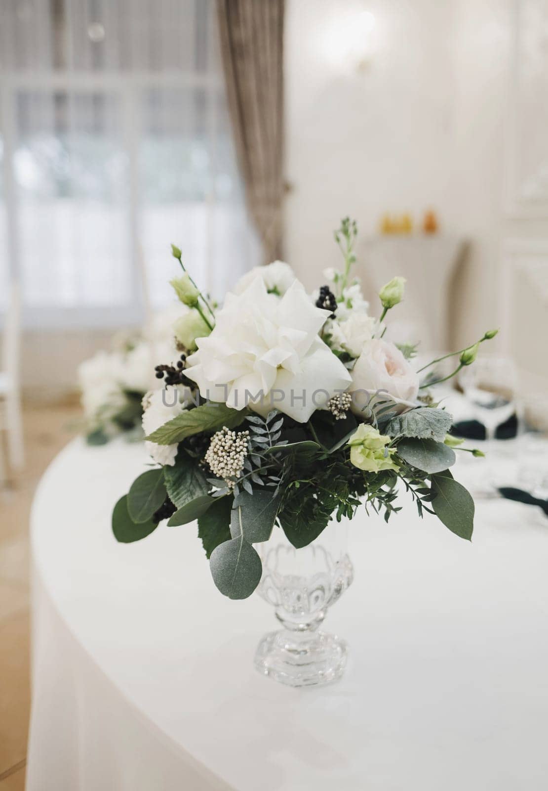 wedding decor, flowers. wedding reception table setting on wedding day