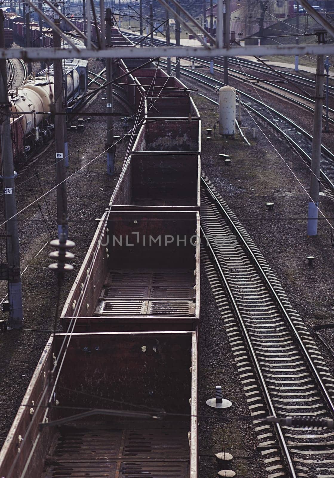 Cargo train platform with container on rail station