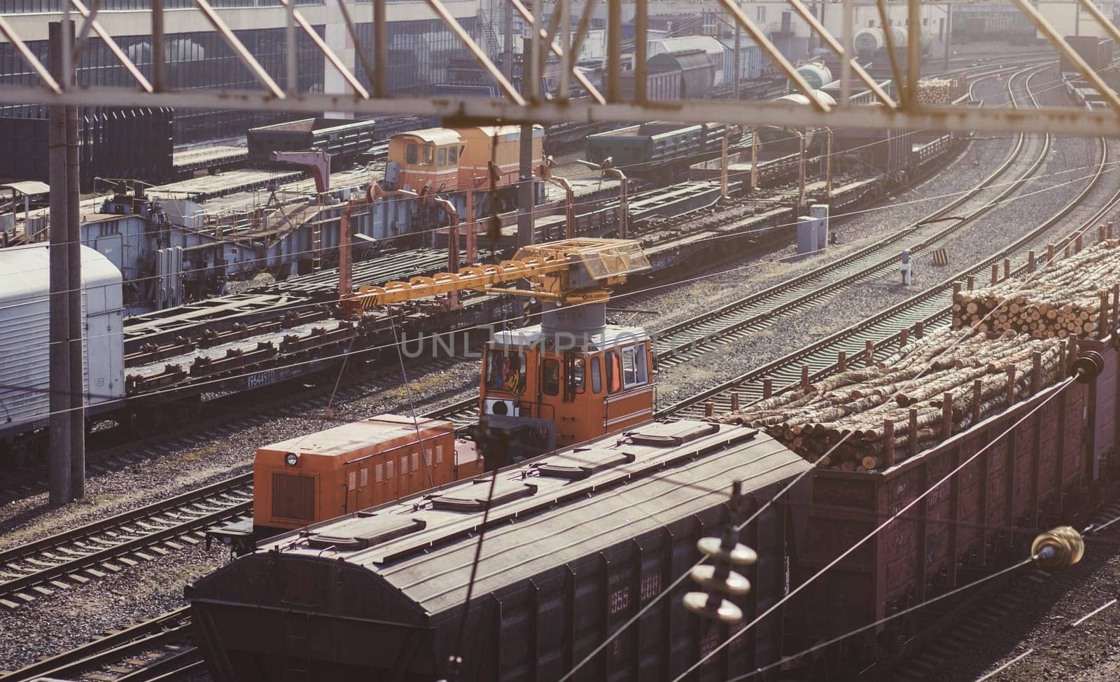 railway depot with freight trains and locomotives