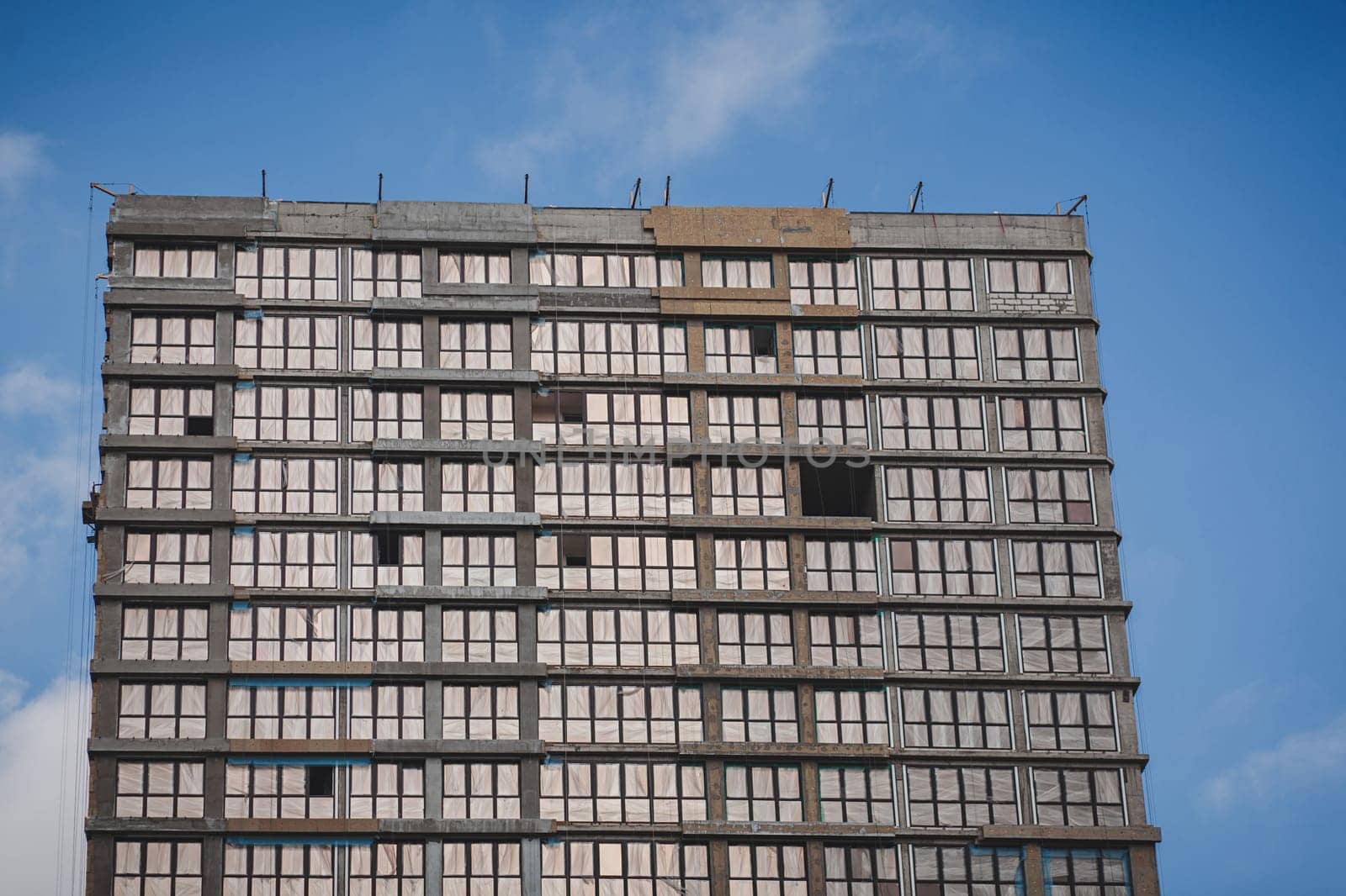 Construction site with a high-rise building under construction
