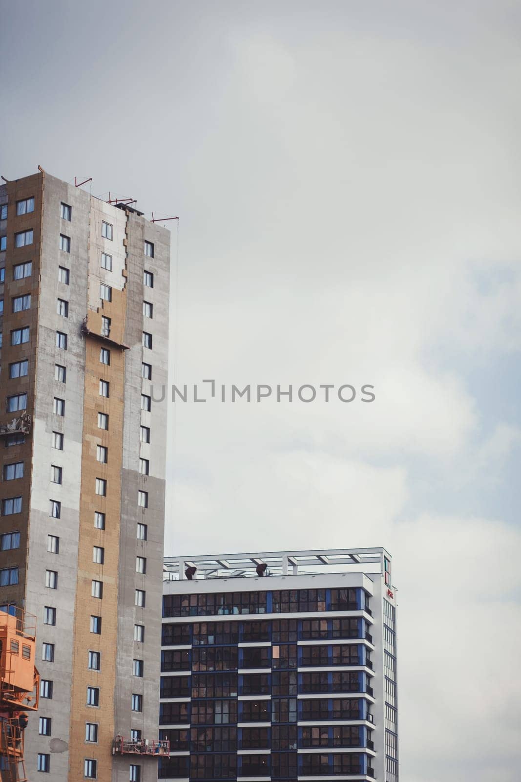 construction of a high-rise residential building against the sky. mortgage