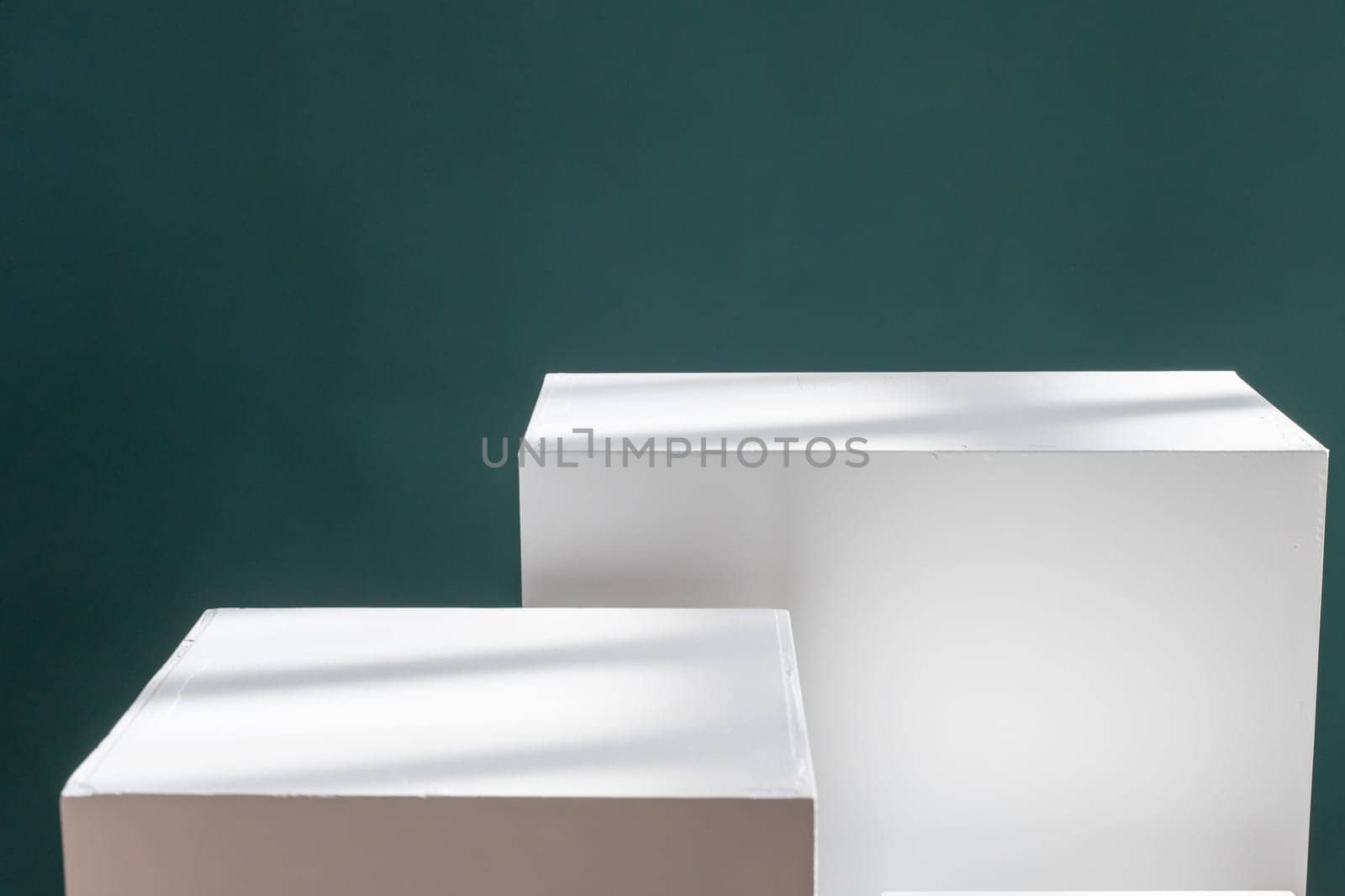 Product photography green background . Pedestal for cosmetic product and packaging mockups. by PaulCarr