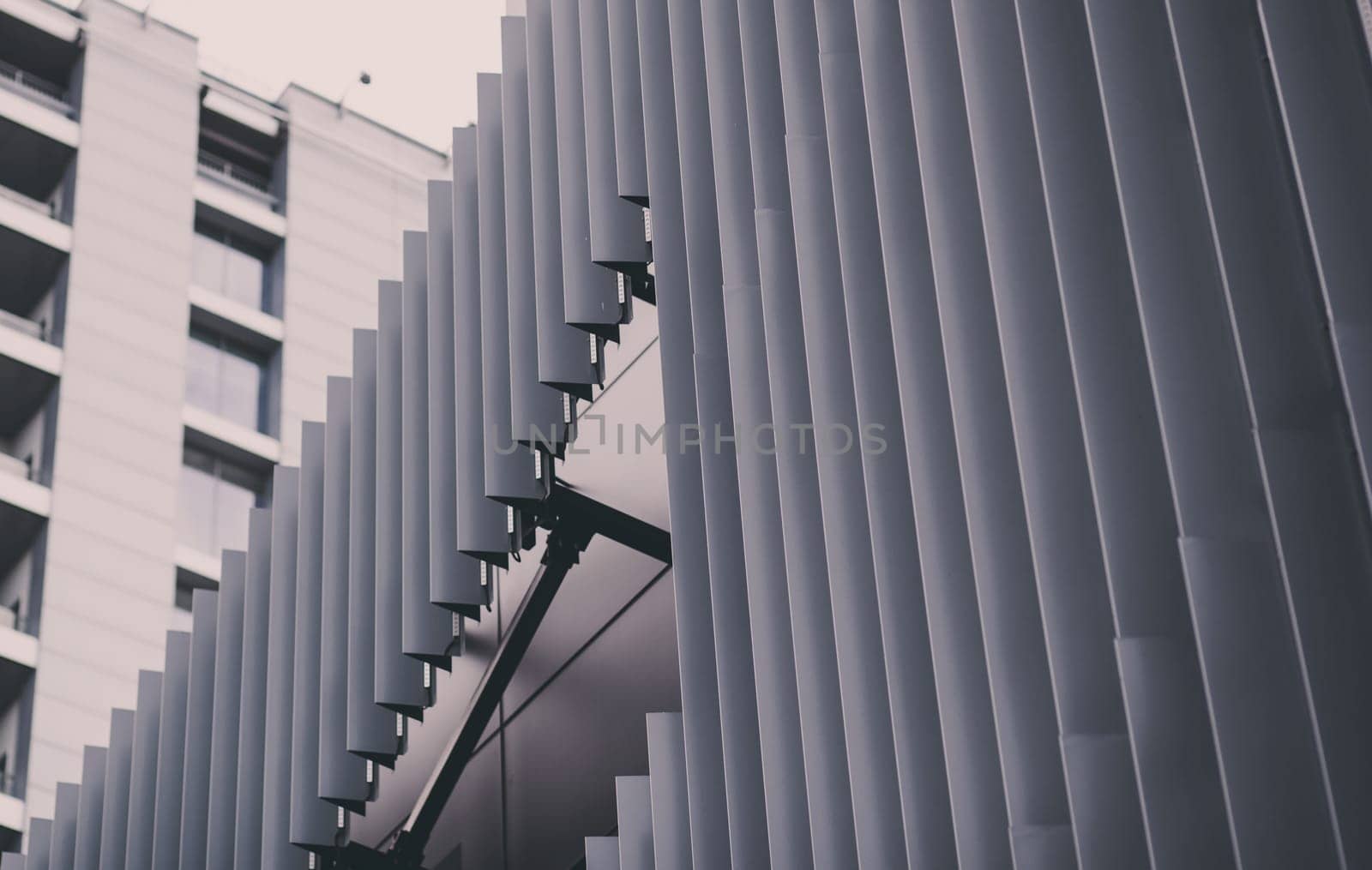 Metallic wall or roof panels. Close-up fragment of minimalist business building interior. Abstract modern