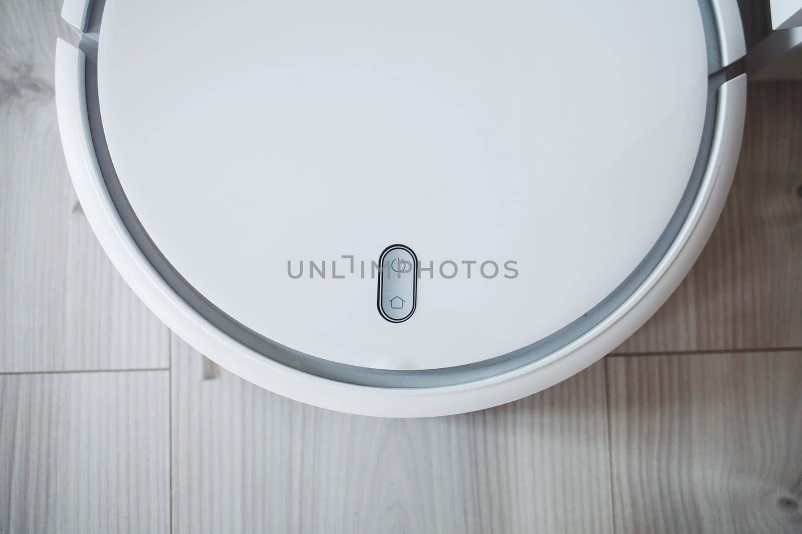 white robot vacuum cleaner floor cleaning machine