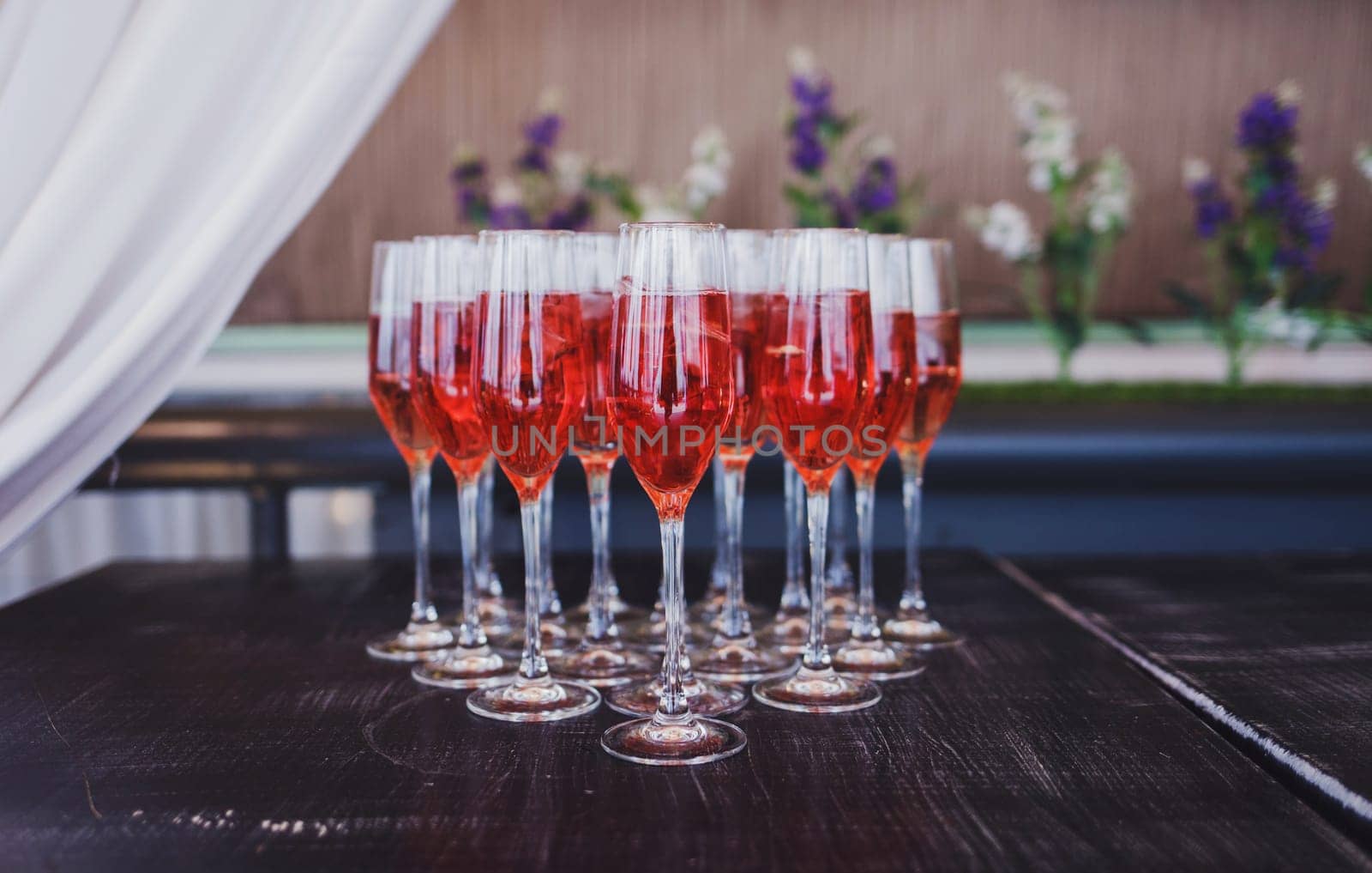 Group glasses of wine are on the table in wedding day