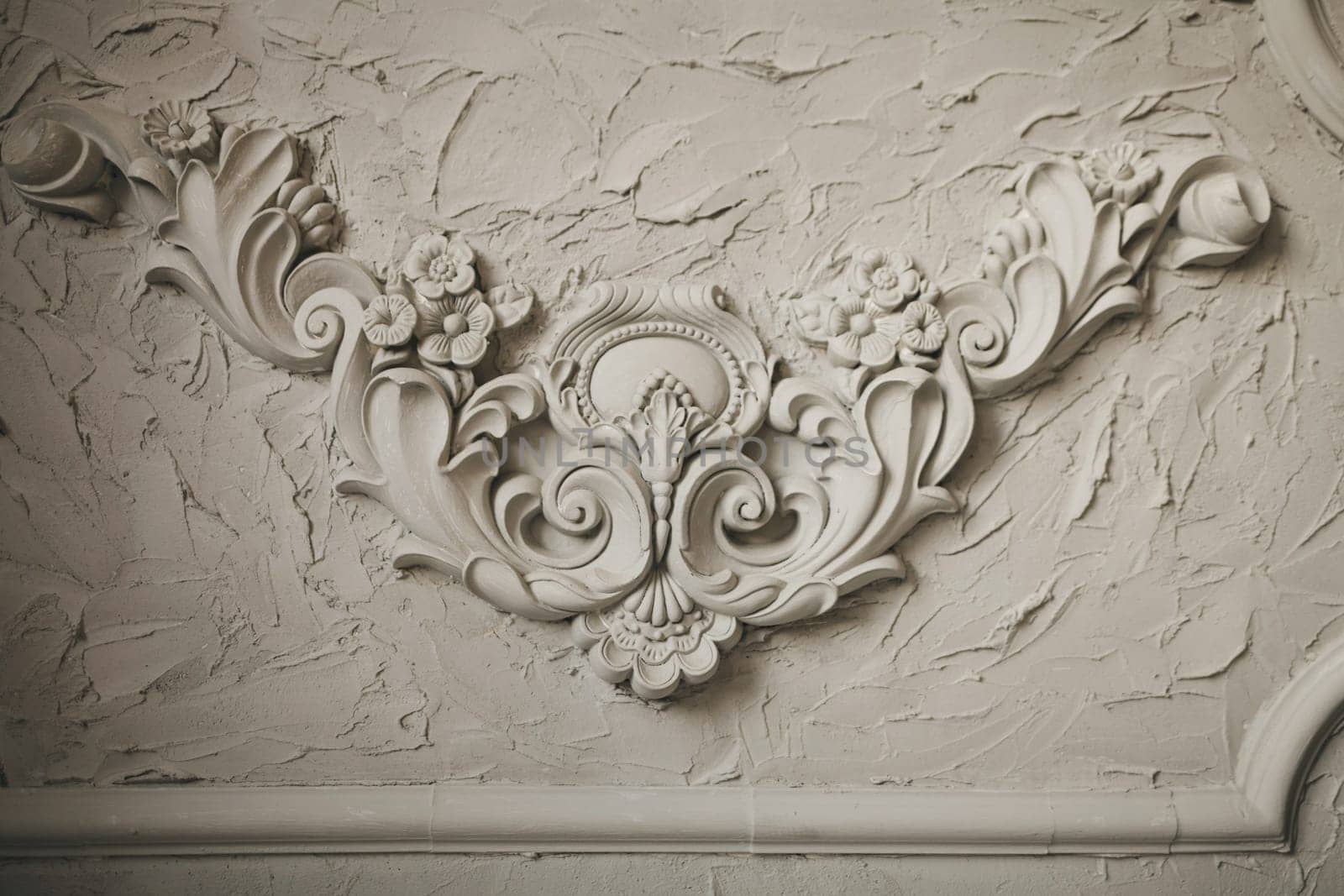 Plaster background floral pattern. antique decor