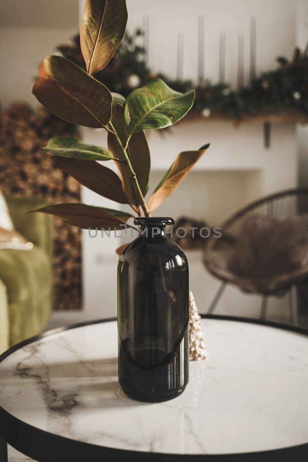 small pot with a plant stands in a beautiful modern interior