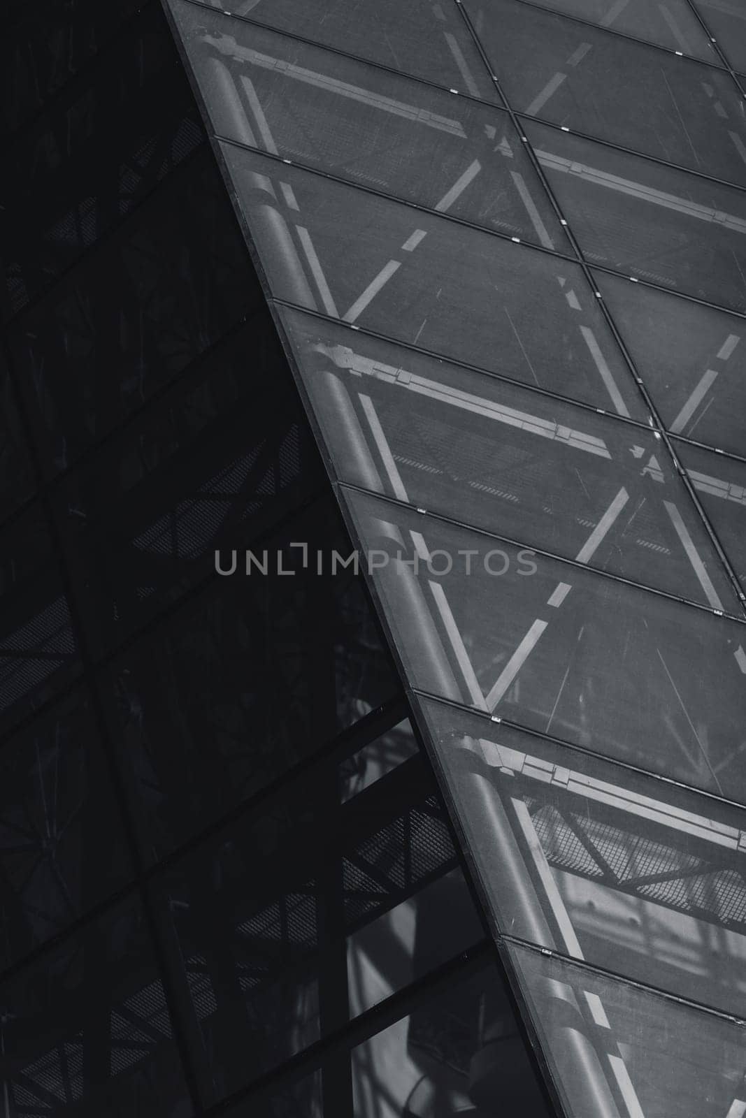 Modern office building with glass material. Abstract architecture photo.