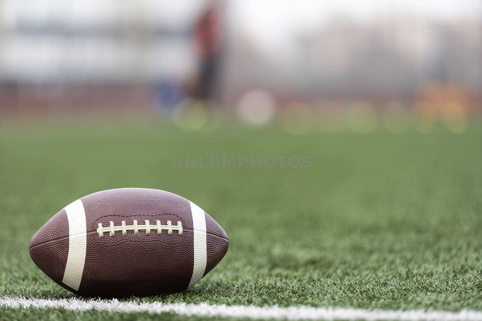 American Football with the Fifty Yard Line Beyond. High quality photo