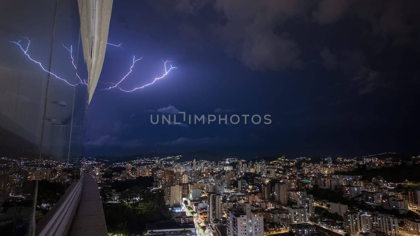 Spectacular Nighttime Lightning Over Urban Landscape by FerradalFCG