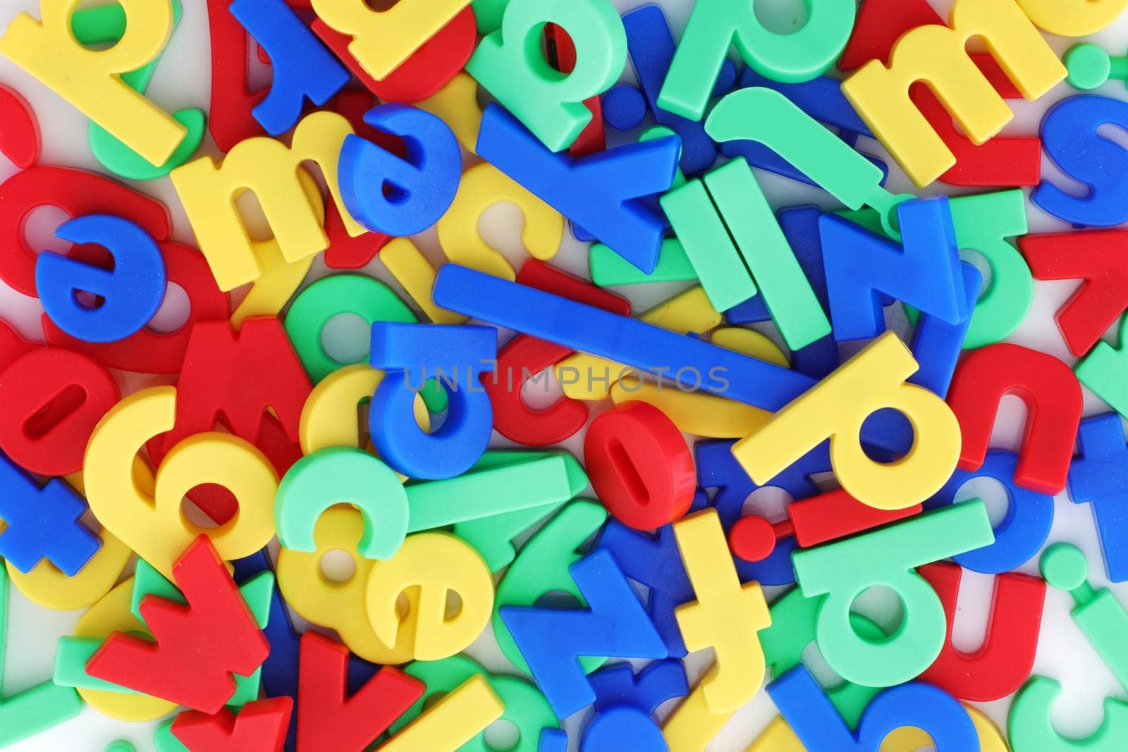 A coloured alphabet magnetic letters background